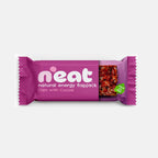 A N'eat brand natural energy flapjack bar in its packaging, featuring a purple wrapper with white text and a clear window showing the oats and cocoa mixture inside